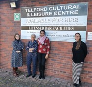 people standing in front of Telford cultural centre