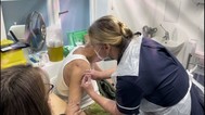 Michael-Randall-receives-vaccine-from-Linda-Hart