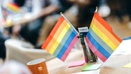 in the cafe pic of rainbow flag at a table