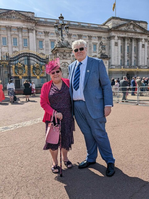 Jim and his wife at the palace