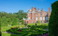 Bodrhyddan Hall red brick mansion and box hedge gardens