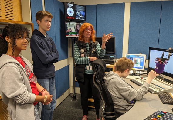 two participants are shown round a studio at bbc radio shropshire