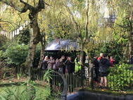 photograph of participants enjoying their artwork instalation at Telford Town Park