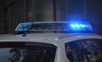 Police car with blue flashing lights
