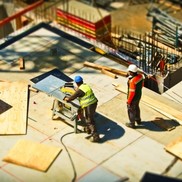 Construction workers on site in high vis clothing