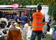 A crew member in a high visi jacket at Leigh Folk Festival.