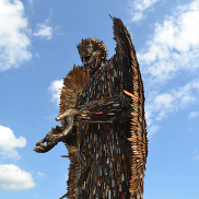 A sculpture of a winged angel made from over 100,000 confiscated knives.