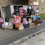 A large collection of waste which has been flytipped