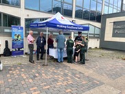 Police, ambulance and community safety colleagues outside police station
