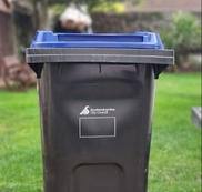 A blue lidded Southend-on-Sea City Council waste bin