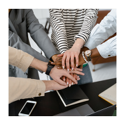 A group of hands together in agreement.