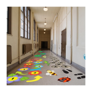 Sensory circuit mat in a school hall.