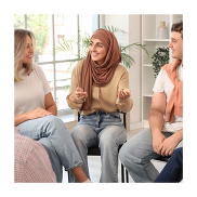 A group of three women sitting next to each other talking.