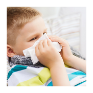 Child with a tissue paper over his nose.