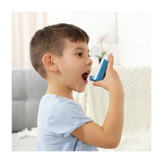 Child using an asthma pump.