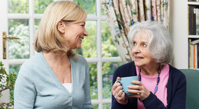 Image of carer with woman.
