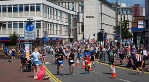 Image of IRONMAN athletes in Stafford Town Centre from 2018