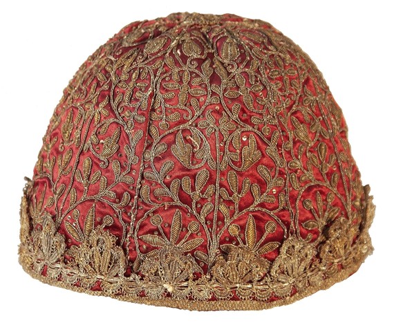 Red silk cap embroidered with gold and silver thread