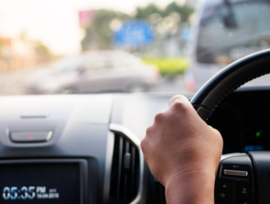 Person driving a car