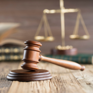 Judges Gavel and 'scales of justice' in the background