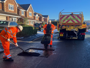 Crews working in Stone