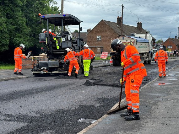 Highways crews working on a road