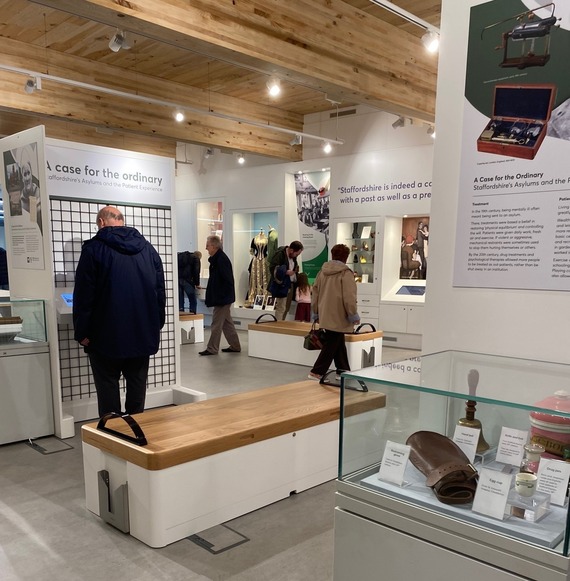 Photograph of visitors looking at the displays in the new History Centre