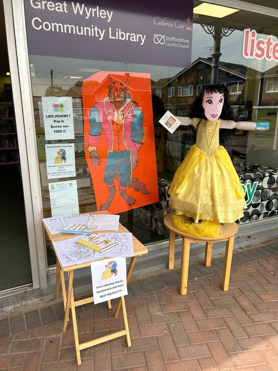Sam the Great Wyrley Community Library mascot dressed as Belle from Beauty and the Beast