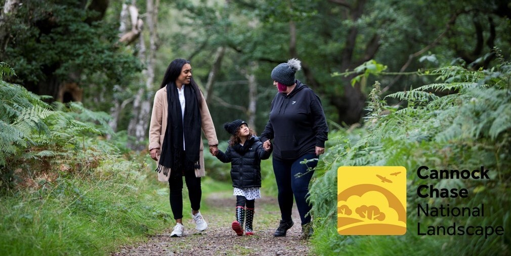 2 ladies and a girl walking on Cannock Chase