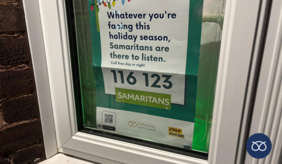 samaritans poster on window