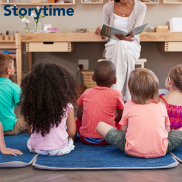 Storytime. A person reading to a group of children