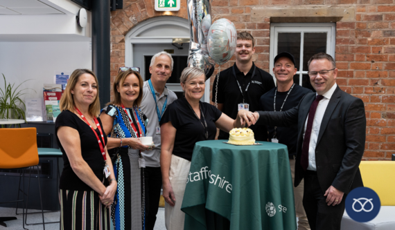 Philip White celebrating Shire Hall Business Centre’s two year anniversary with its tenant businesses.