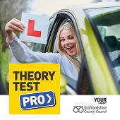 Smiling young lady holding her Learner driver plate