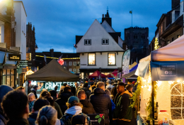 St Albans Charter Market in December looking towards the Clock Tower and St Albans Cathedral tower