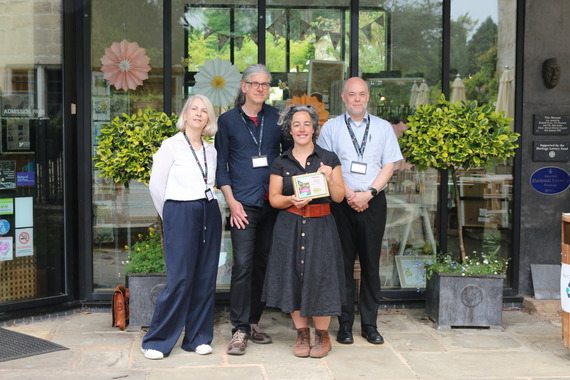 Cllr Beki Aldam and members of Museum in the Park staff with the Slow Travel Award