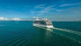 A cruise ship sailing on the sea.