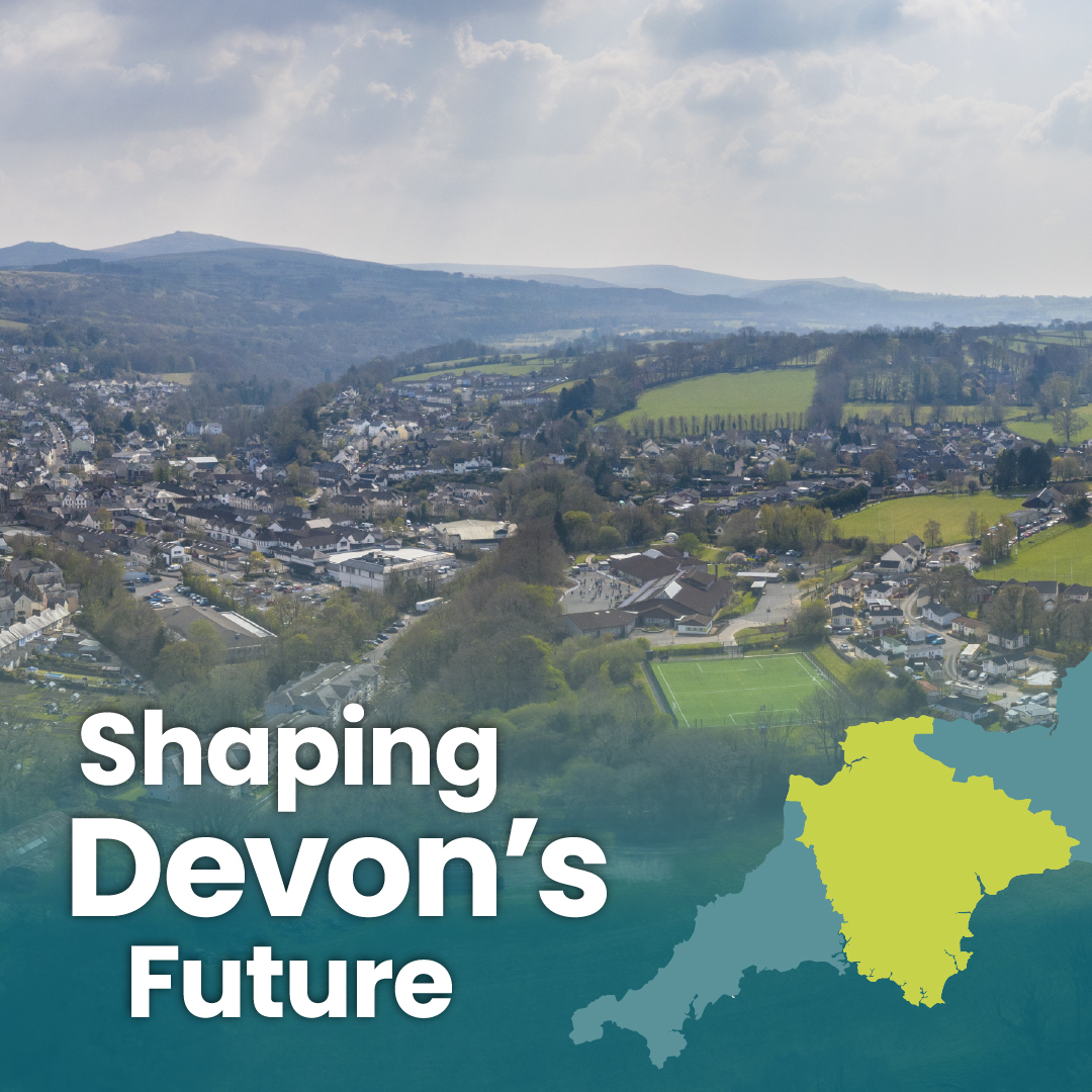 WD-Shaping Devon's Future. Aerial photo of town with fields in the distance.