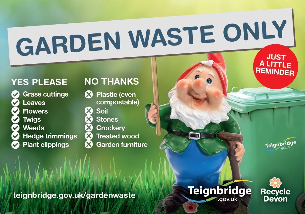 Garden gnome beside a green waste bin. Garden waste only, just a little reminder, lists of what can and cannot be disposed of in a green bin