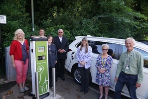 Councillors and officers at new EV charging point in Barton Hill Carpark, Dawlish