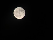 Moon against black sky