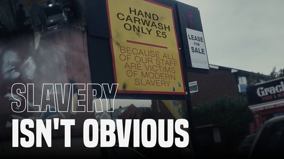 Sign saying: Hand car wash only £5 because all of our staff are victims of modern slavery.  Slavery isn't obvious