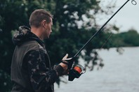 angler holding a fishing rod