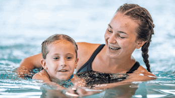 lady and child in swimming pool