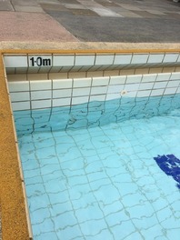 Lido pool showing falling water level