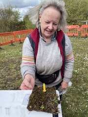 Catriona holding a petalwort plant