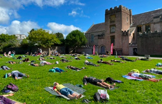 Torre Abbey green yoga taking place