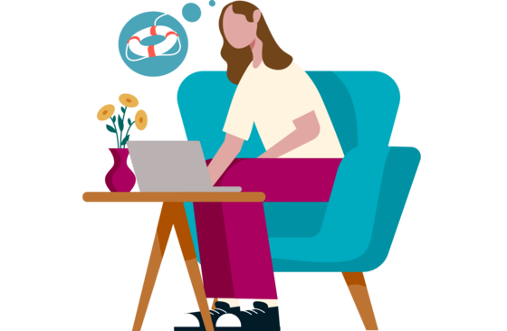 Woman sitting on chair looking at laptop