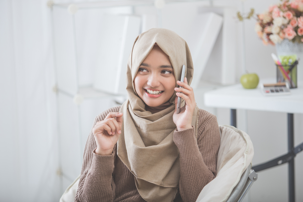 Woman providing support over the phone