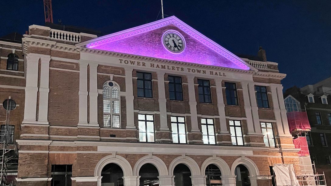 tower hamlets town hall lit up purple for the queen's platinum jubilee