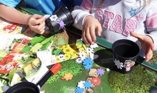 photo of arts and craft activity using plant pots